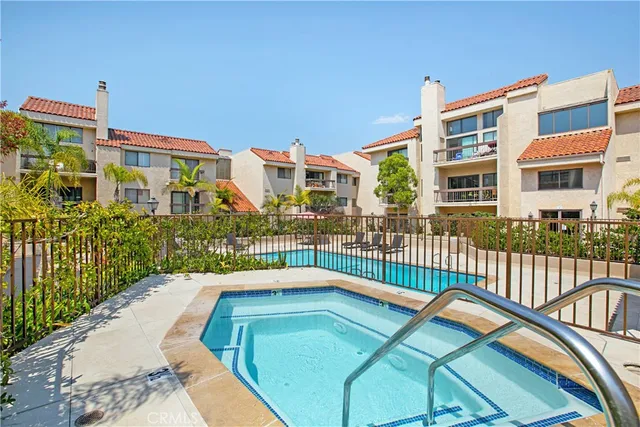 a view of a house with swimming pool