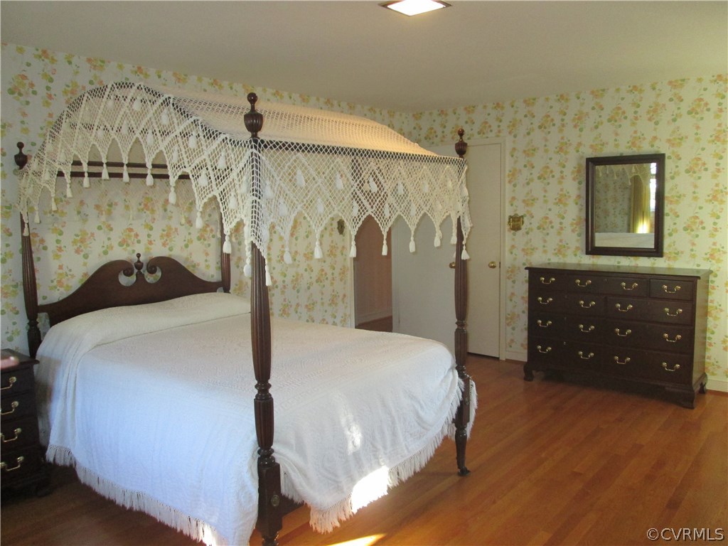 8222 Overbury Road Richmond, VA 23227 - Photo 13 of 16 Master bedroom with newly refinished hardwood floo