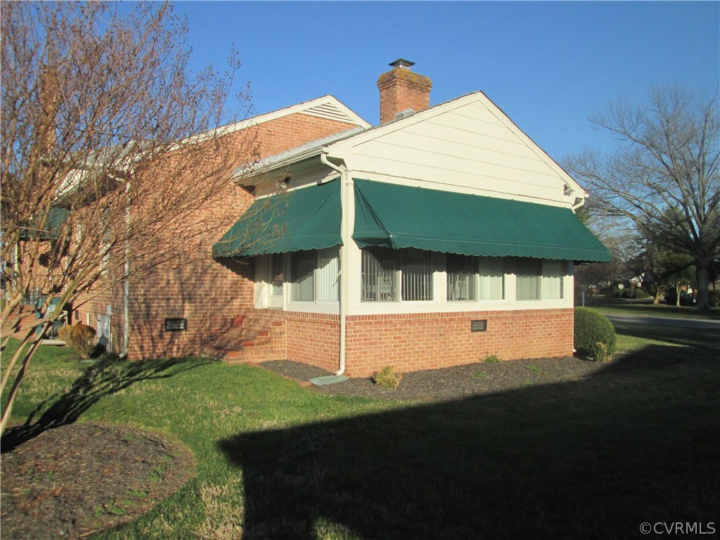 8222 Overbury Road Richmond, VA 23227 - Photo 14 of 16 Outside view of sunroom with protective awnings.
