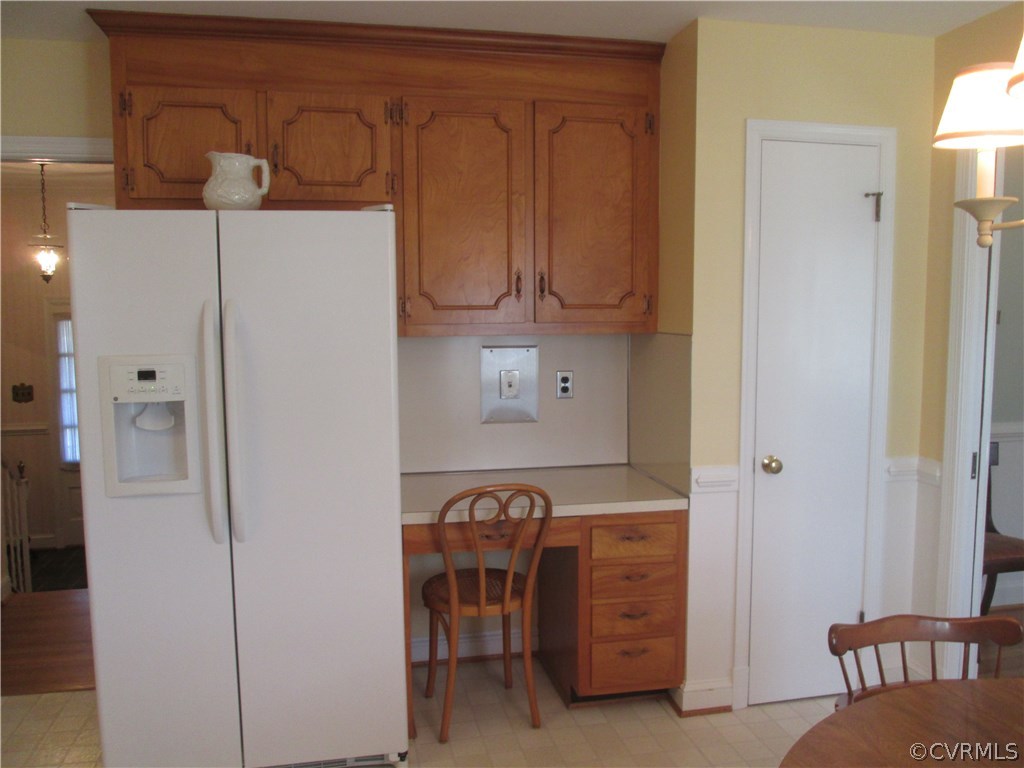 8222 Overbury Road Richmond, VA 23227 - Photo 10 of 16 Built in desk in kitchen