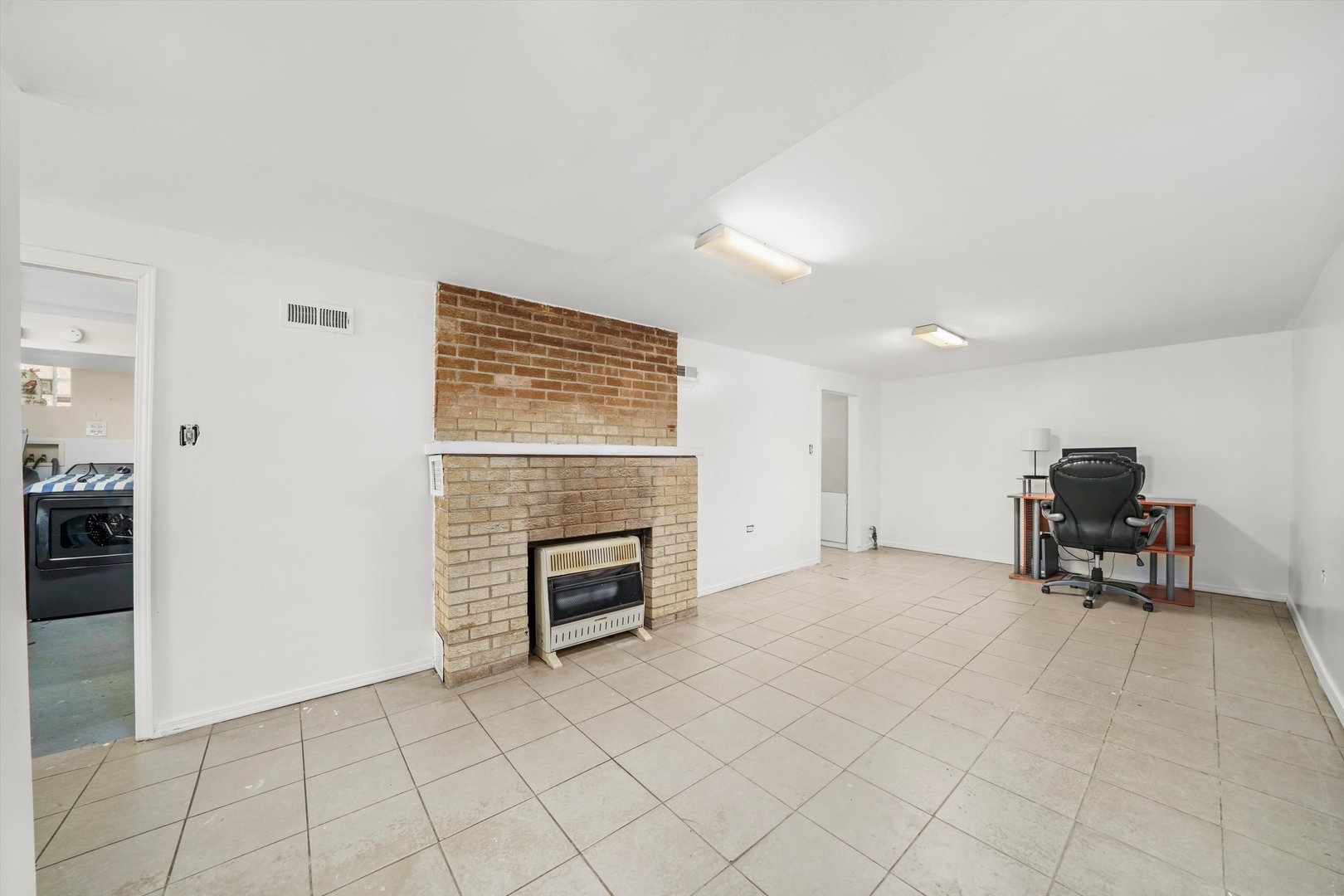 3401 Jackson Street Bellwood, IL 60104 - Photo 13 of 26 a view of kitchen with furniture and a refrigerator