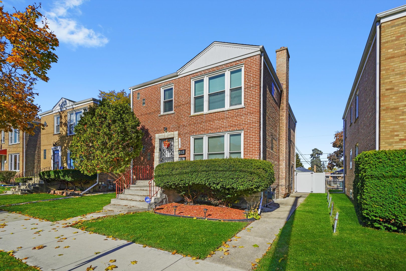 3401 Jackson Street Bellwood, IL 60104 - Photo 2 of 26 a front view of a house with a yard
