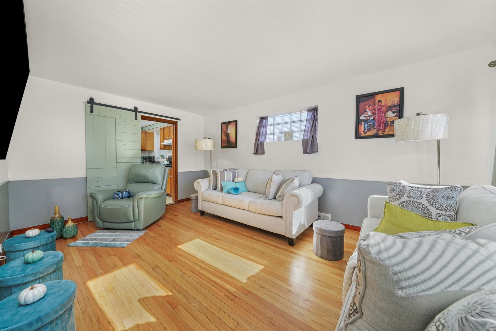 3401 Jackson Street Bellwood, IL 60104 - Photo 4 of 26 a living room with furniture and a wooden floor