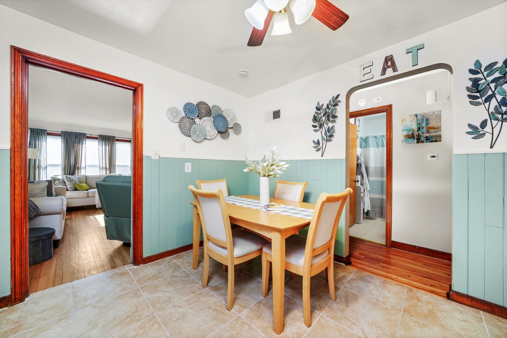 3401 Jackson Street Bellwood, IL 60104 - Photo 6 of 26 a view of a dining room with furniture and wooden floor