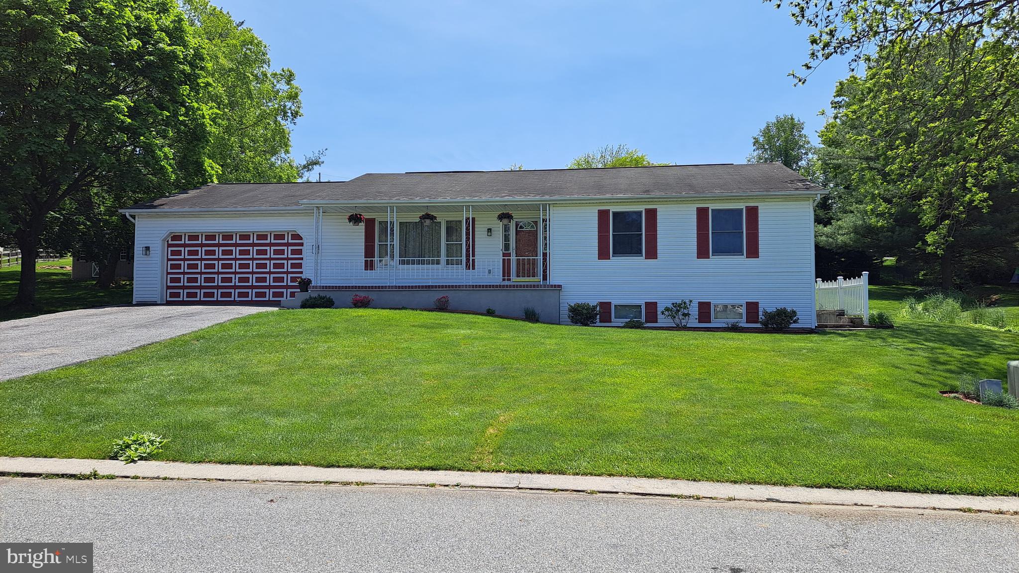 212 Ridley Drive York, PA 17402 - Photo 1 of 68 a view of a house with a garden