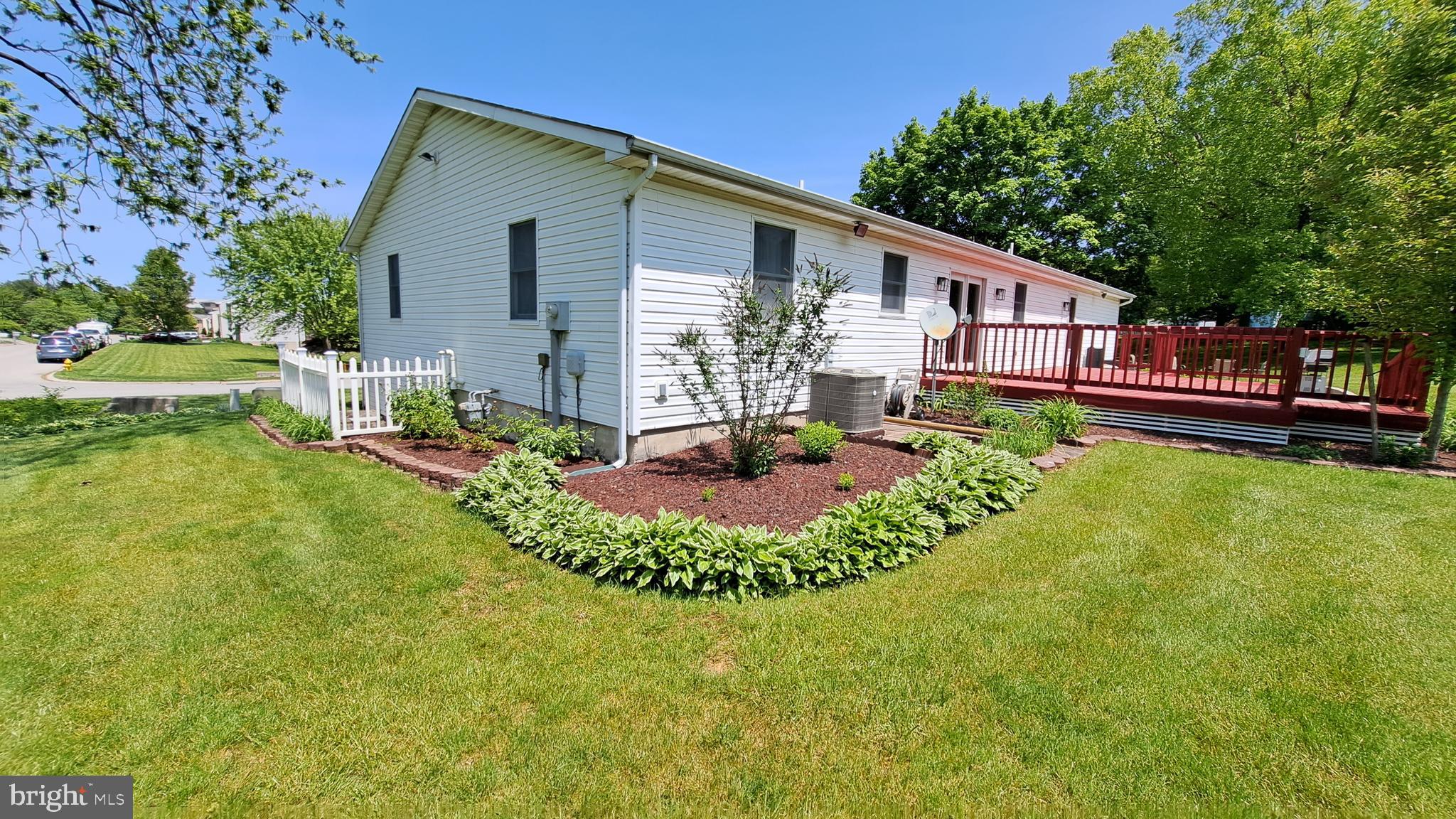 212 Ridley Drive York, PA 17402 - Photo 22 of 68 a front view of a house with swimming pool having outdoor seating