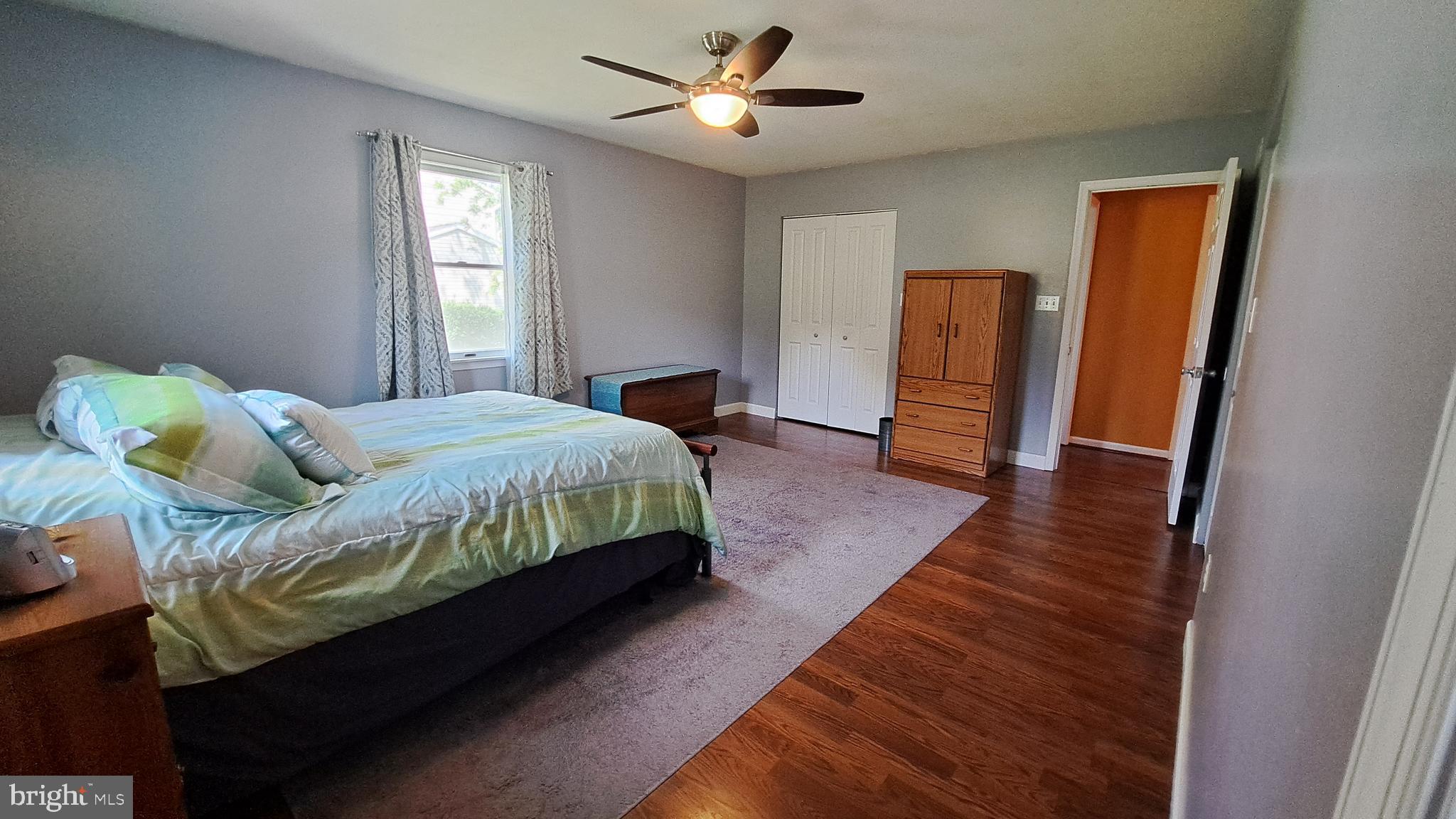 212 Ridley Drive York, PA 17402 - Photo 44 of 68 a bedroom with a bed and a chandelier