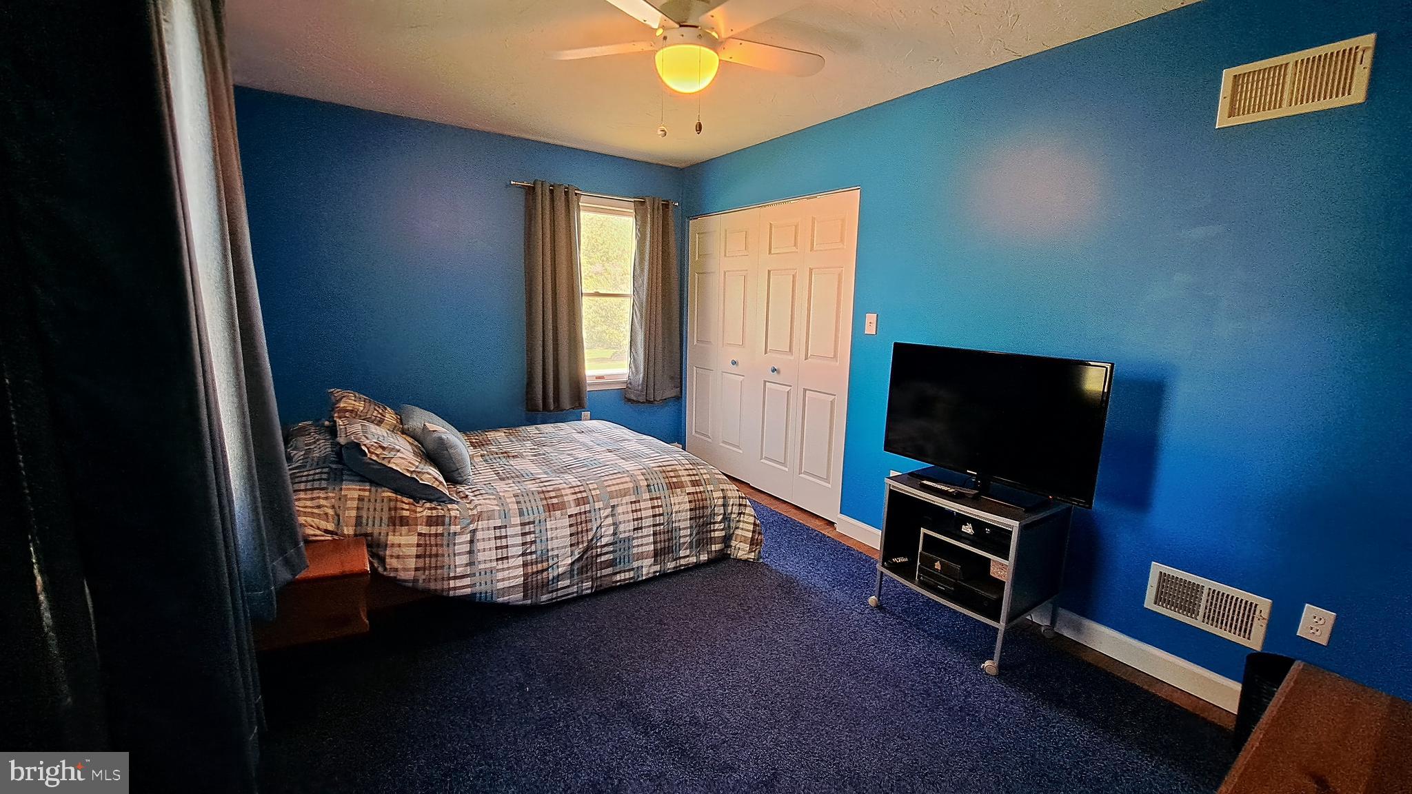 212 Ridley Drive York, PA 17402 - Photo 49 of 68 a bedroom with furniture and flat screen tv