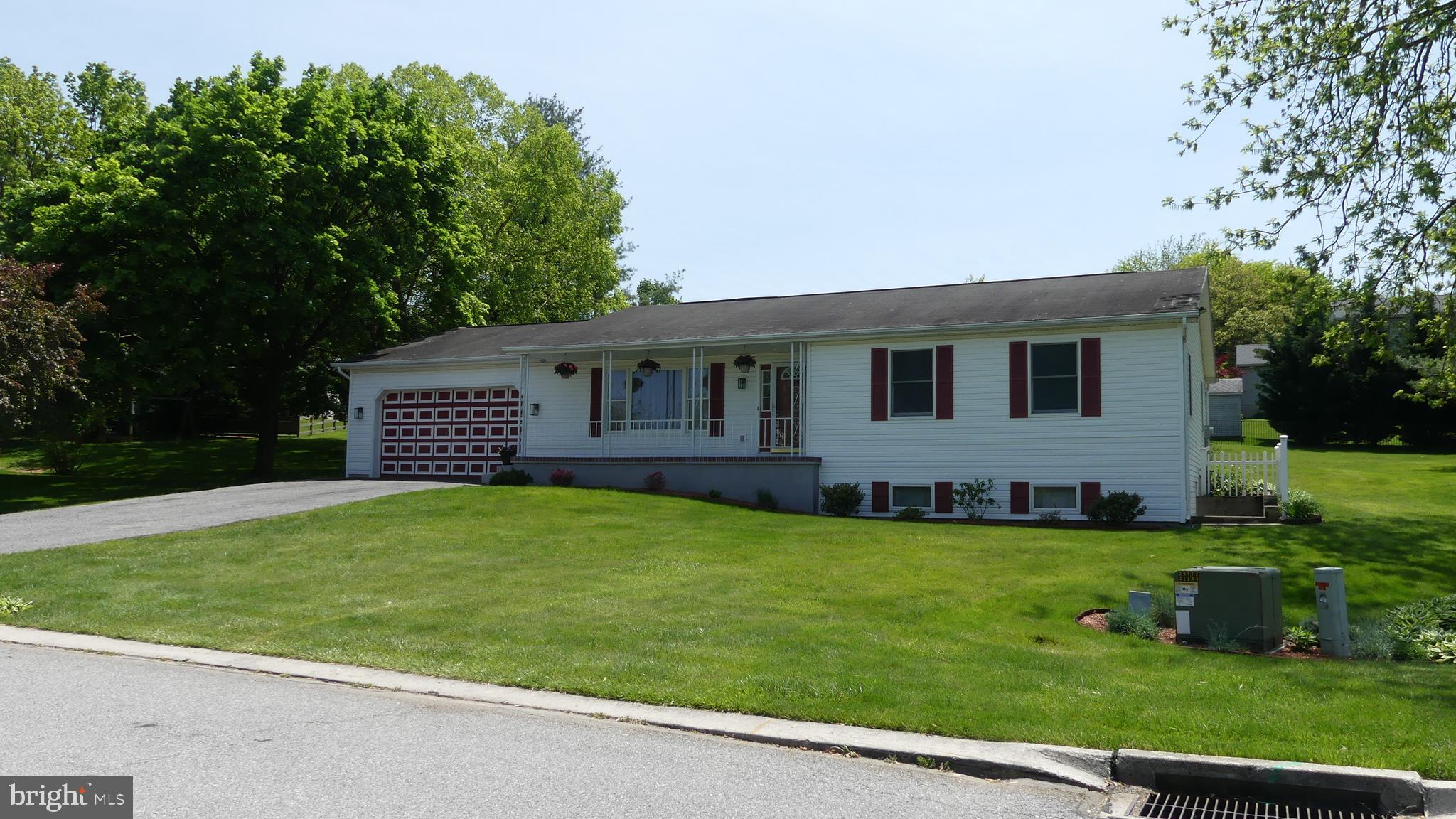 212 Ridley Drive York, PA 17402 - Photo 5 of 68 a view of a house with backyard and garden