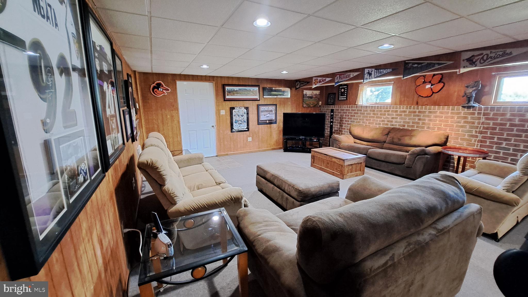 212 Ridley Drive York, PA 17402 - Photo 58 of 68 a media room with lots of chairs and a projector