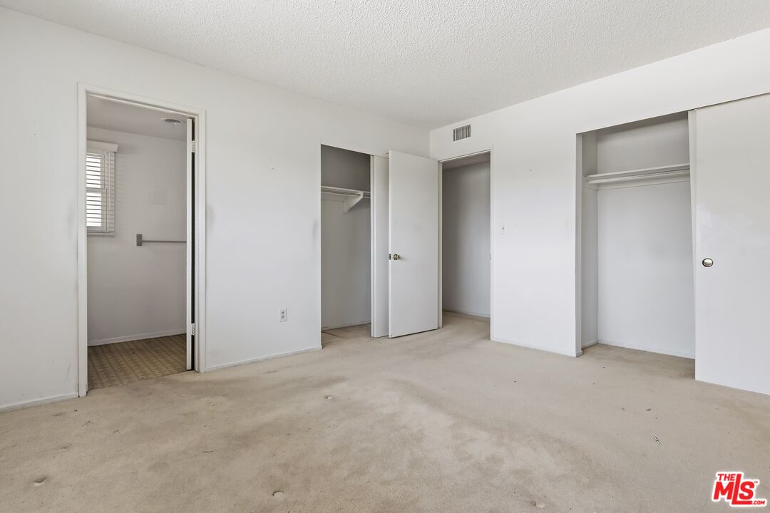 19131 Tulsa Street Porter Ranch, CA 91326 - Photo 25 of 43 an empty room with closet area