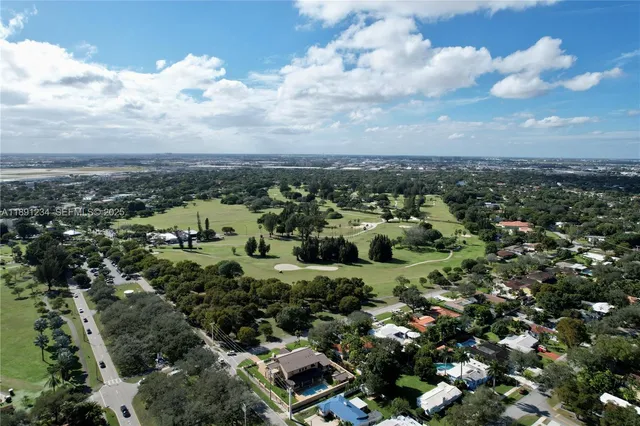 an aerial view of a city with lots of residential buildings