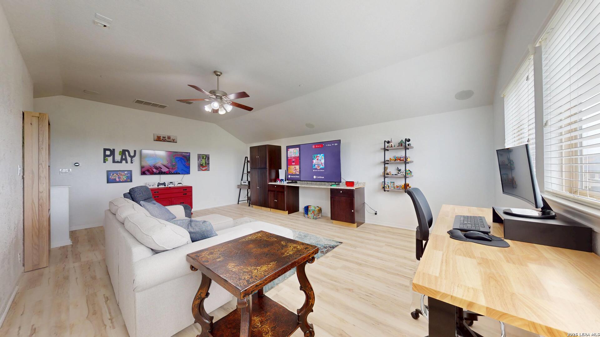 10111 Shallow Bank Converse, TX 78109 - Photo 53 of 65 a living room with furniture and a flat screen tv