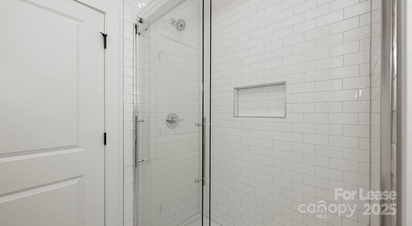 5150 Old Ridge Road, Unit B2 Charlotte, NC 28269 - Photo 15 of 27 a bathroom with a shower