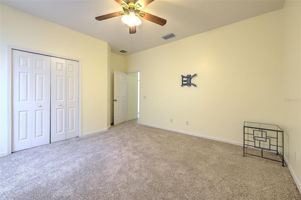 5409 Conch Shell Place Apollo Beach, FL 33572 - Photo 30 of 51 an empty room with windows and fan