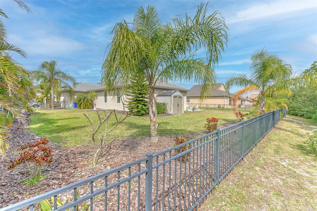 5409 Conch Shell Place Apollo Beach, FL 33572 - Photo 37 of 51 a view of a house with a yard