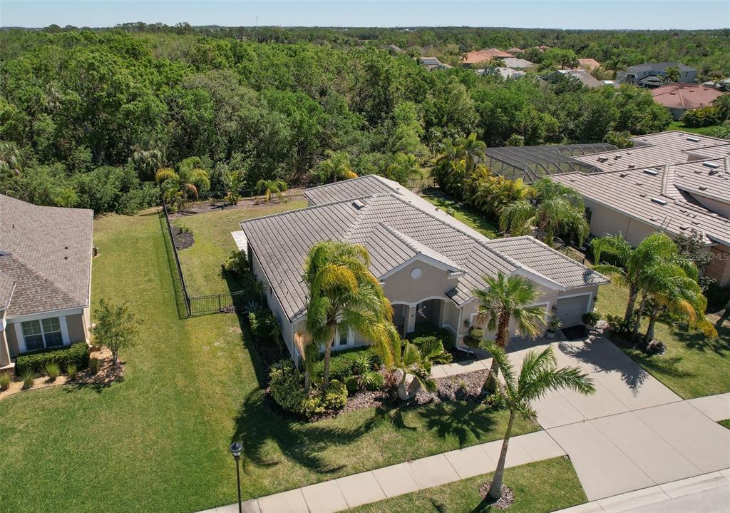 5409 Conch Shell Place Apollo Beach, FL 33572 - Photo 4 of 51 an aerial view of a house with a garden