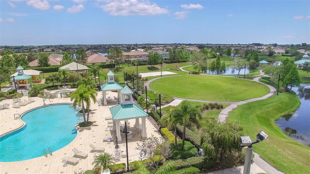 5409 Conch Shell Place Apollo Beach, FL 33572 - Photo 41 of 51 an aerial view of a residential houses with outdoor space and trees