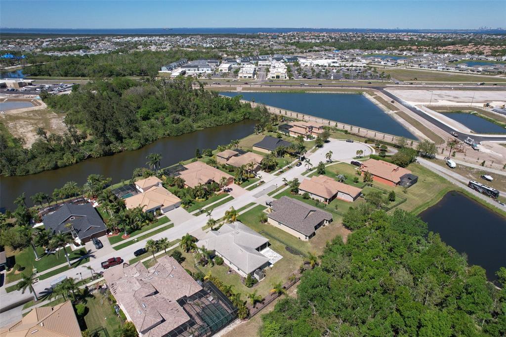 5409 Conch Shell Place Apollo Beach, FL 33572 - Photo 49 of 51 an aerial view of ocean and residential houses with outdoor space