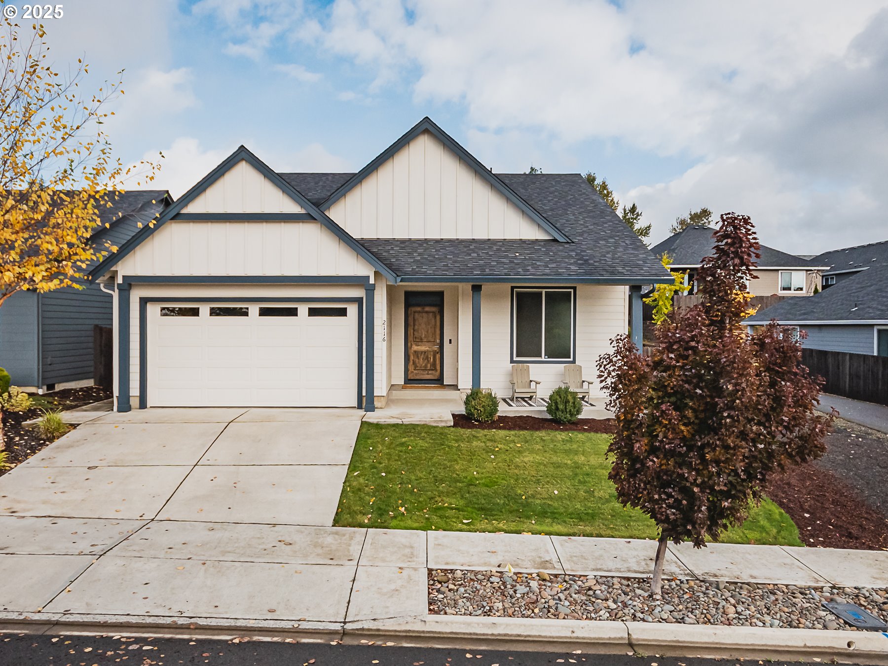 front view of a house and a yard