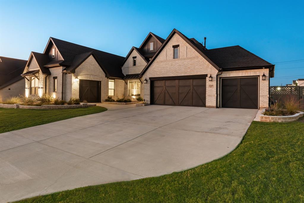 2248 Meander Way Northlake, TX 76247 - Photo 2 of 40 a front view of a house with yard