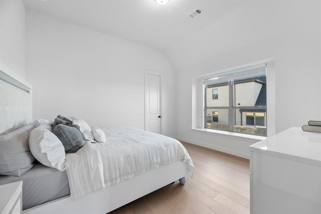 2248 Meander Way Northlake, TX 76247 - Photo 24 of 40 a bedroom with a bed and a window