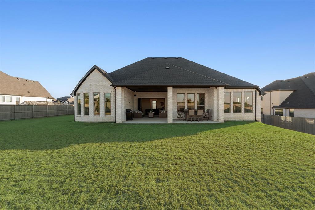 2248 Meander Way Northlake, TX 76247 - Photo 35 of 40 a front view of a house with a garden