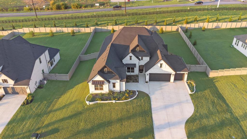 2248 Meander Way Northlake, TX 76247 - Photo 37 of 40 an aerial view of a house with a big yard