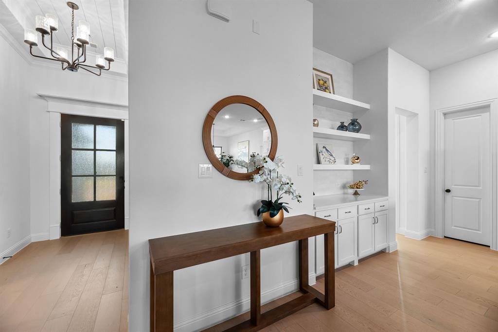 2248 Meander Way Northlake, TX 76247 - Photo 6 of 40 a view of a room with baby toys and wooden floor