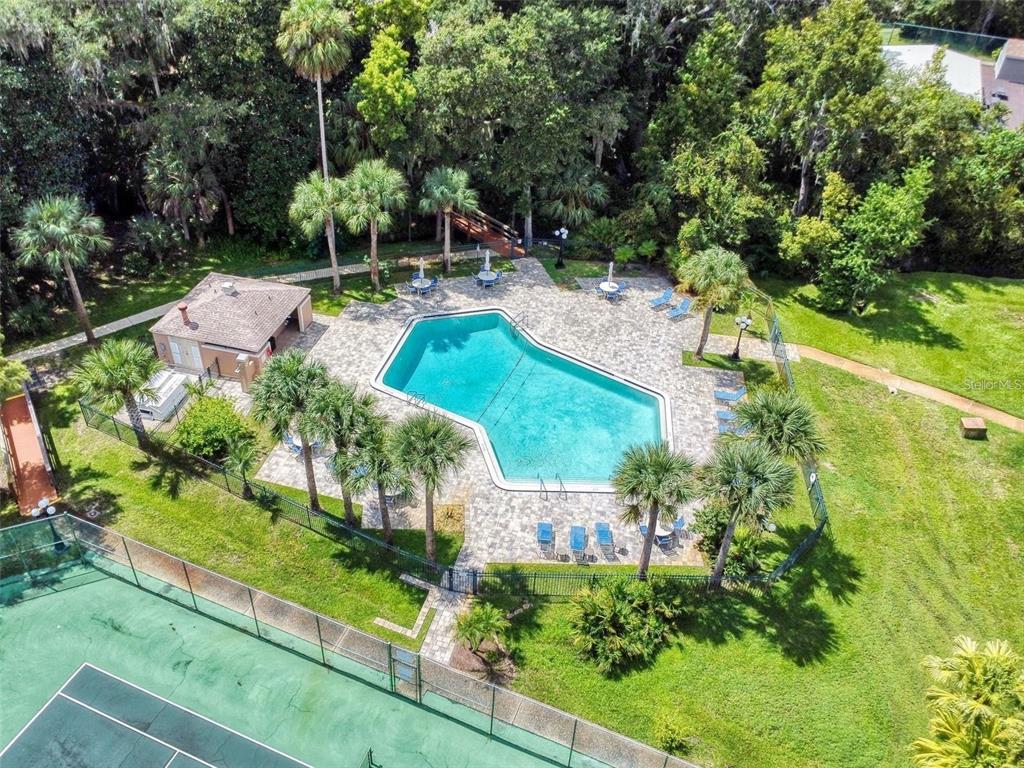 168 Perimeter Court, Unit 5B Deltona, FL 32725 - Photo 30 of 30 an aerial view of a house with yard swimming pool and outdoor seating