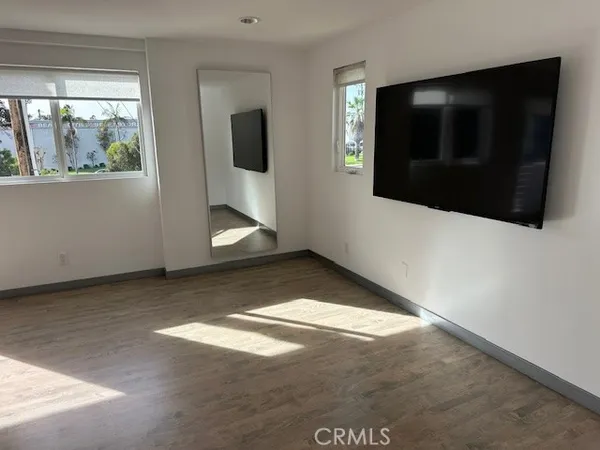 a bathroom with a double vanity sink and mirror