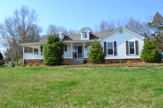 1448 Phillips Road Lebanon, TN 37087 - Photo 1 of 12 14.13 ACRE MINI FARM - 2300 SF - 3 BR - 2 BA - NEW WINDOWS - OFFICE OR REC ROOM - ROOF 1 YEAR OLD - STOCKED POND - WORKSHOP - BARN - CITY WATER