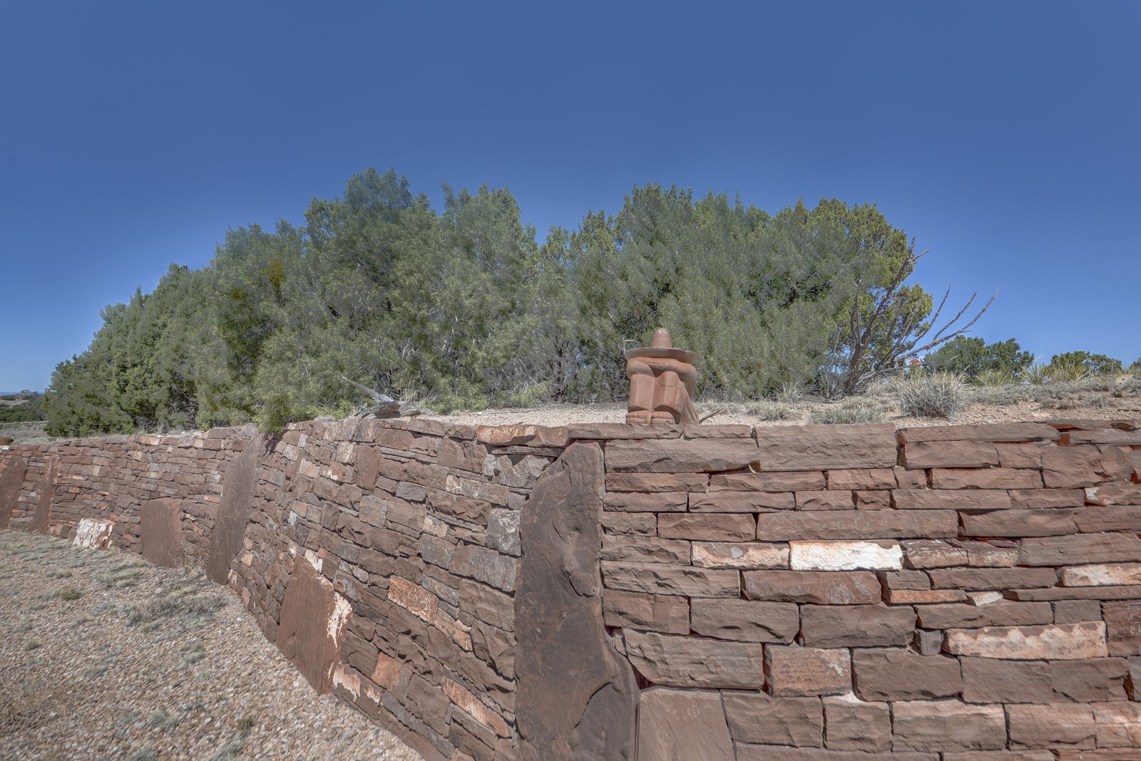 47 Azul Loop Santa Fe, NM 87508 - Photo 3 of 36 Driveway wall.