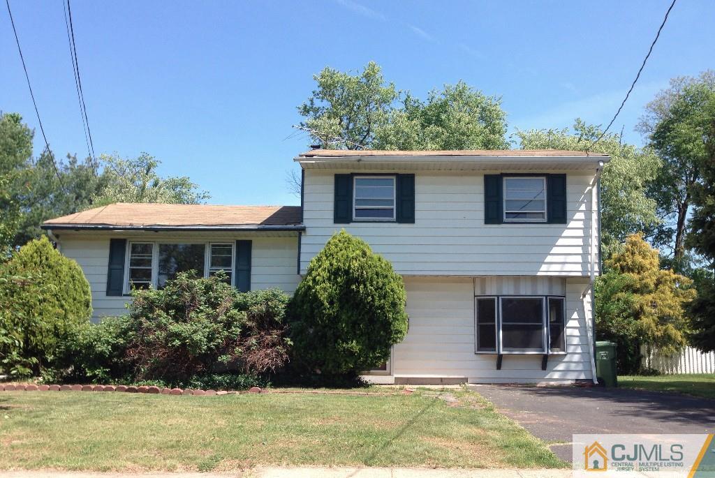 17 Moryan Road Edison, NJ 08817 - Photo 1 of 13 a front view of house with yard