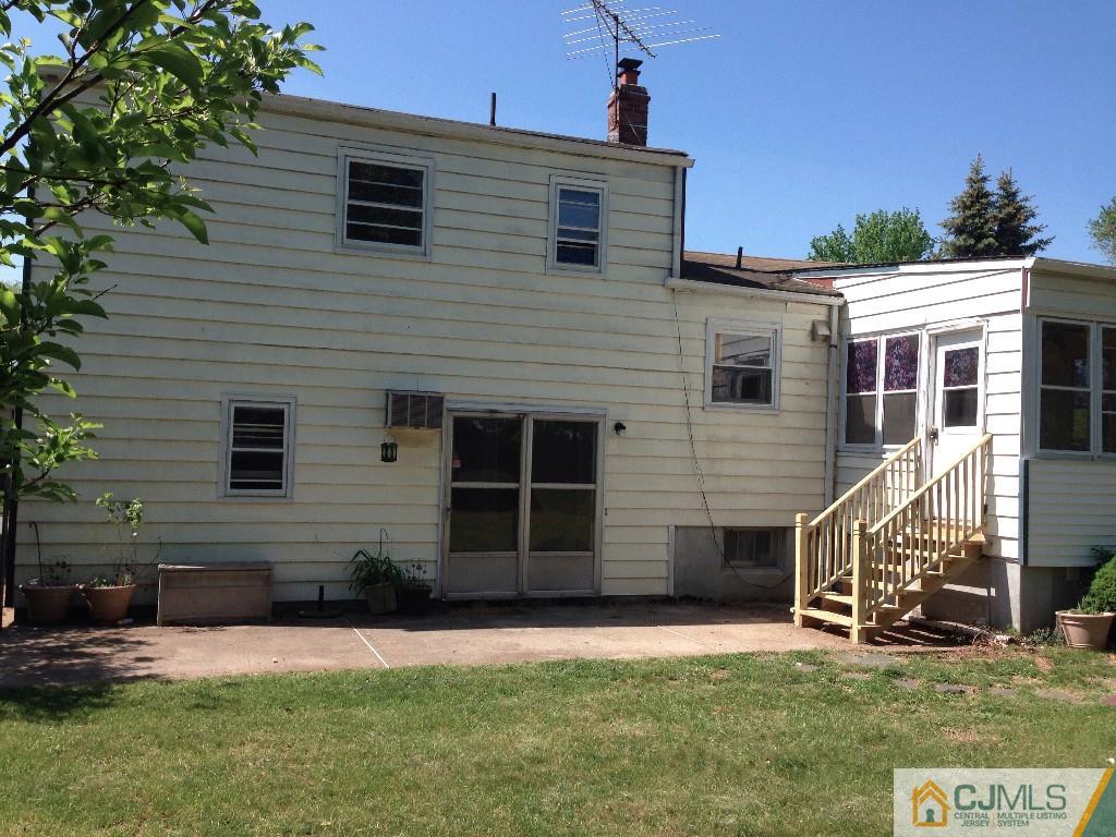 17 Moryan Road Edison, NJ 08817 - Photo 2 of 13 a view of a house with a yard