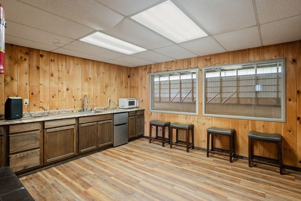147 Wales Road Monson, MA 01057 - Photo 13 of 41 a large kitchen with a large window and stainless steel appliances