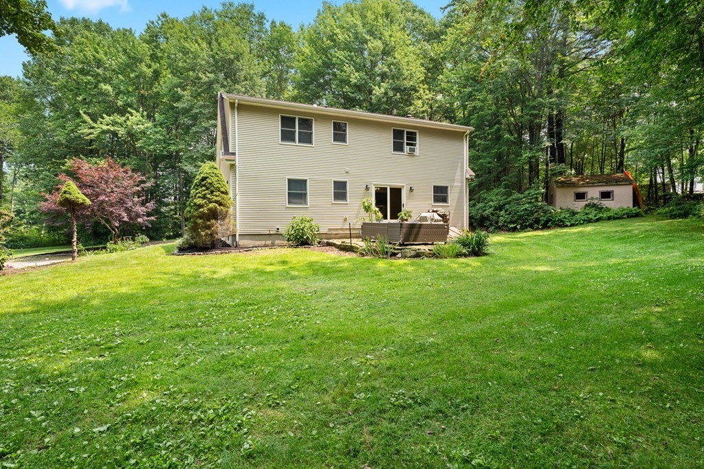 147 Wales Road Monson, MA 01057 - Photo 21 of 41 a view of a house with backyard and sitting area