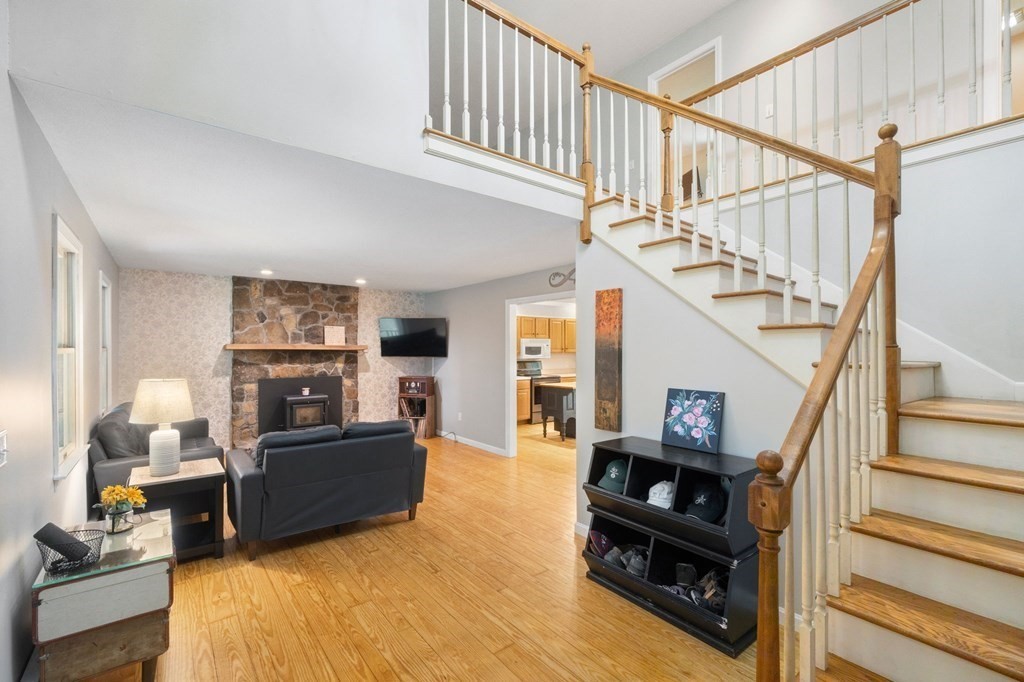 147 Wales Road Monson, MA 01057 - Photo 23 of 41 a living room with furniture and a wooden floor