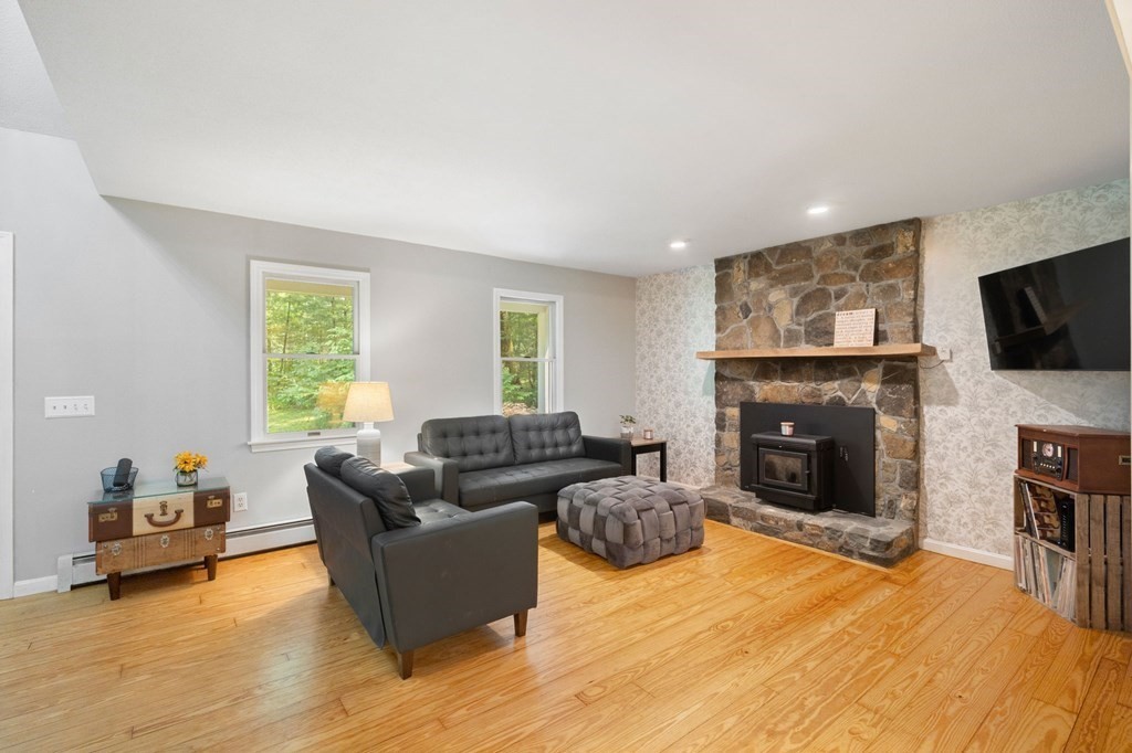 147 Wales Road Monson, MA 01057 - Photo 25 of 41 a living room with furniture and a flat screen tv