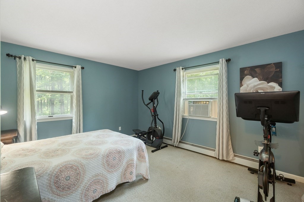 147 Wales Road Monson, MA 01057 - Photo 29 of 41 a bedroom with a bed and a window