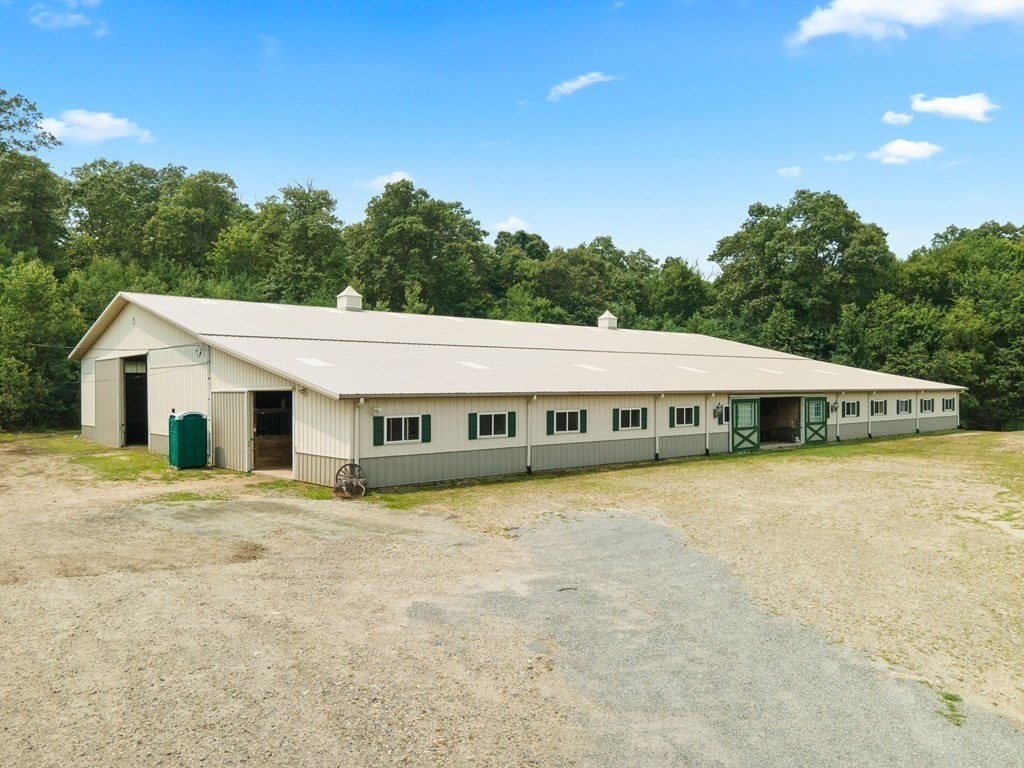 147 Wales Road Monson, MA 01057 - Photo 41 of 41 a front view of a house with a yard