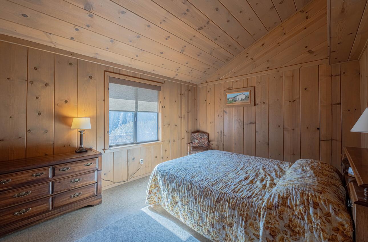 33900 Fabry Road Soledad, CA 93960 - Photo 17 of 34 a bedroom with a bed and a dresser