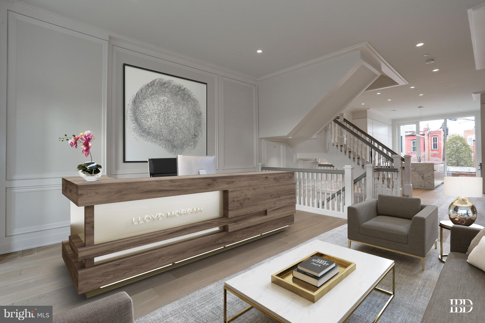 422 C Street Northeast Washington, DC 20002 - Photo 2 of 19 a living room with furniture and a potted plant