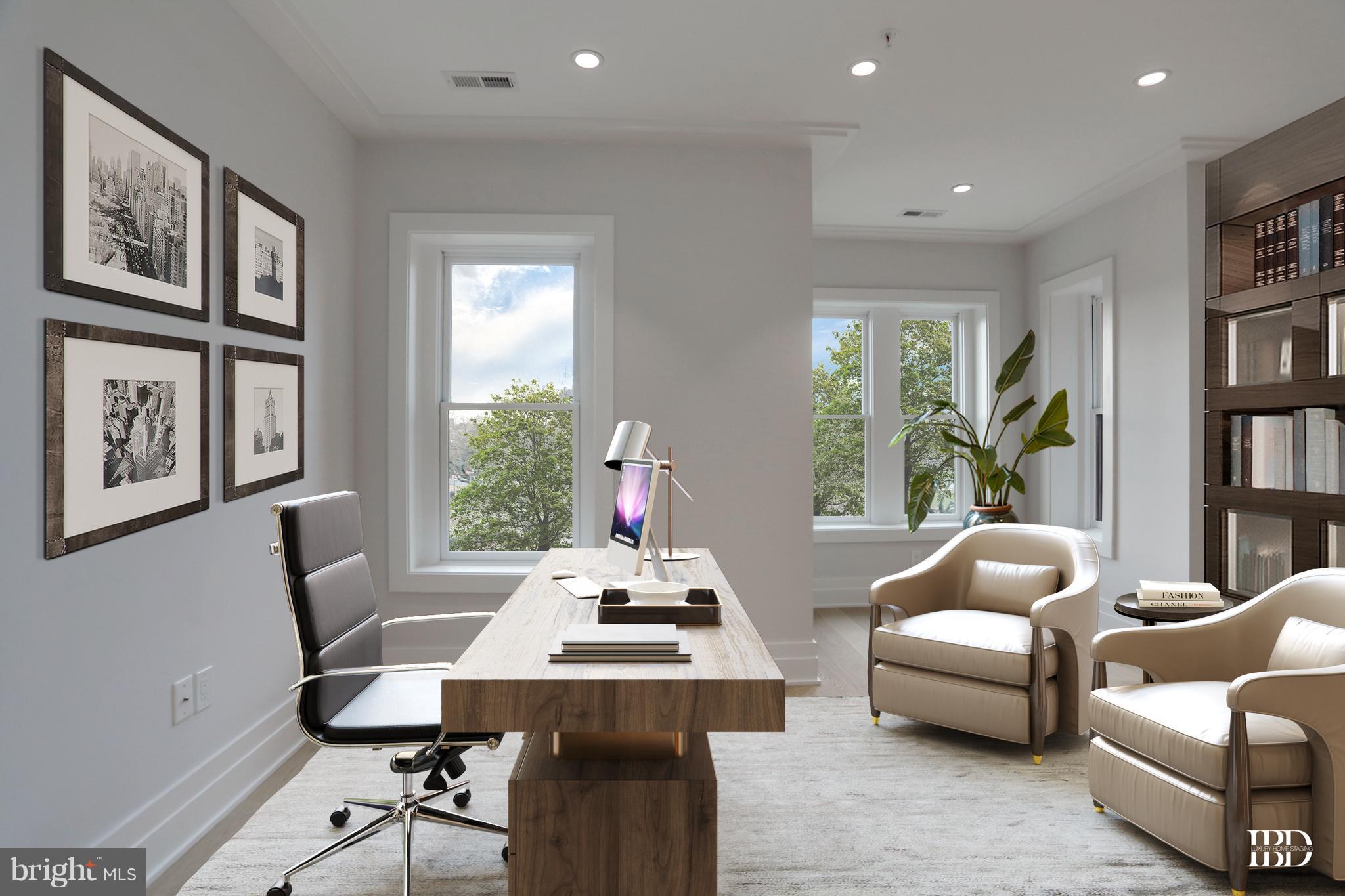 422 C Street Northeast Washington, DC 20002 - Photo 5 of 19 a living room with furniture and a window