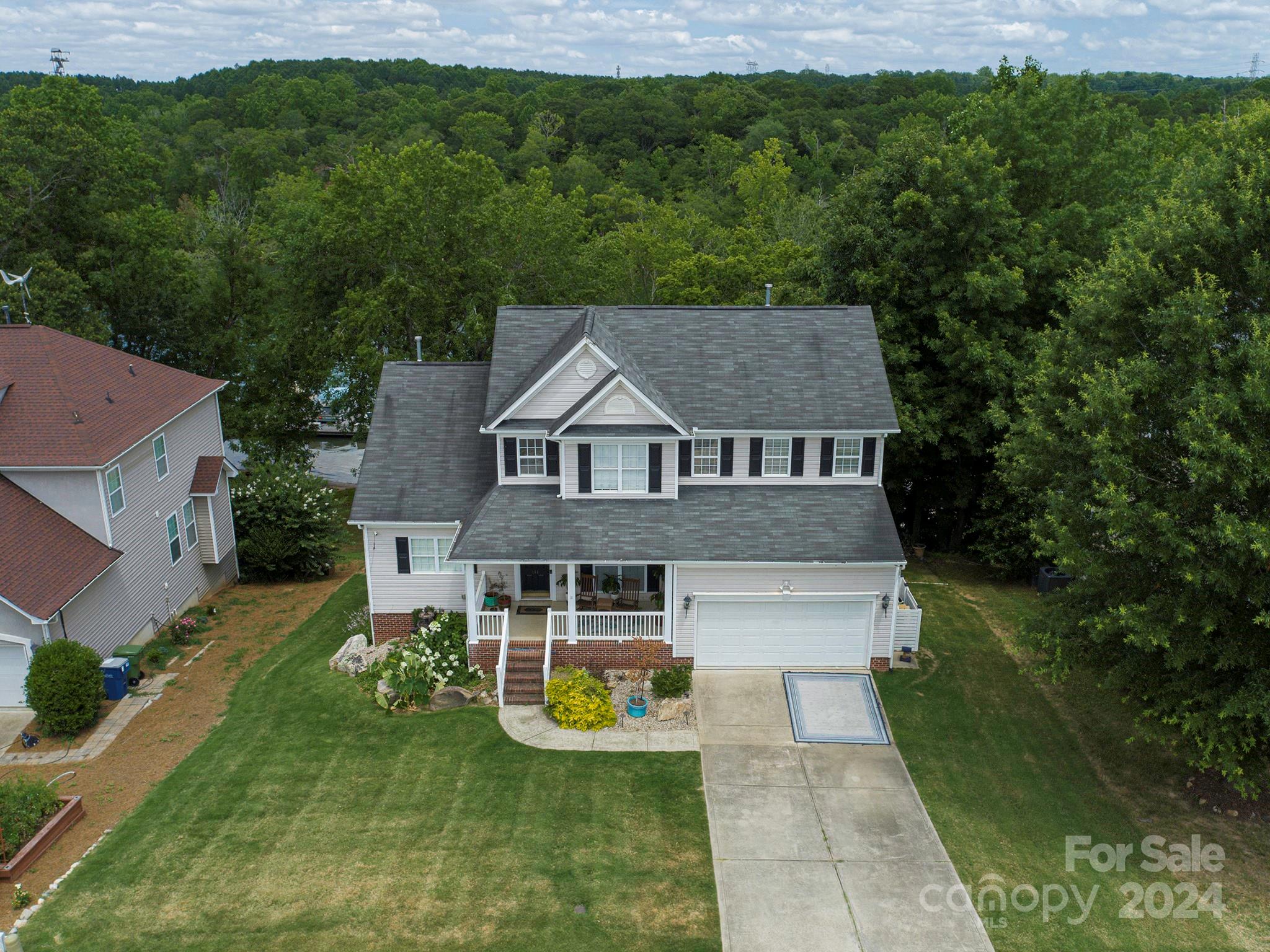 144 Lighthouse Road Mount Holly, NC 28120 - Photo 2 of 48 an aerial view of a house