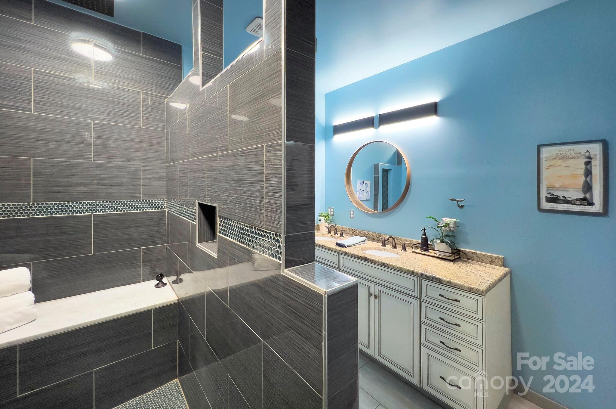 144 Lighthouse Road Mount Holly, NC 28120 - Photo 23 of 48 a bathroom with a sink and a mirror