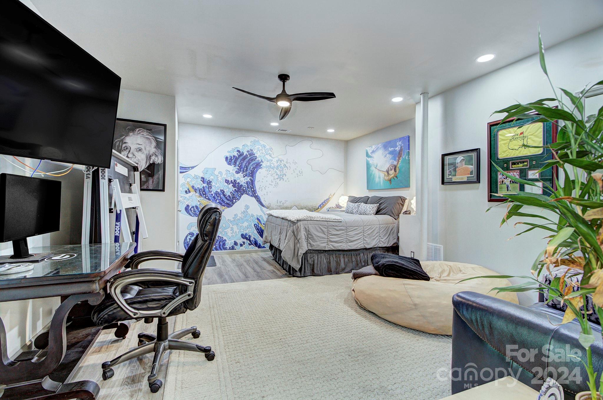 144 Lighthouse Road Mount Holly, NC 28120 - Photo 30 of 48 a living room with furniture and a flat screen tv
