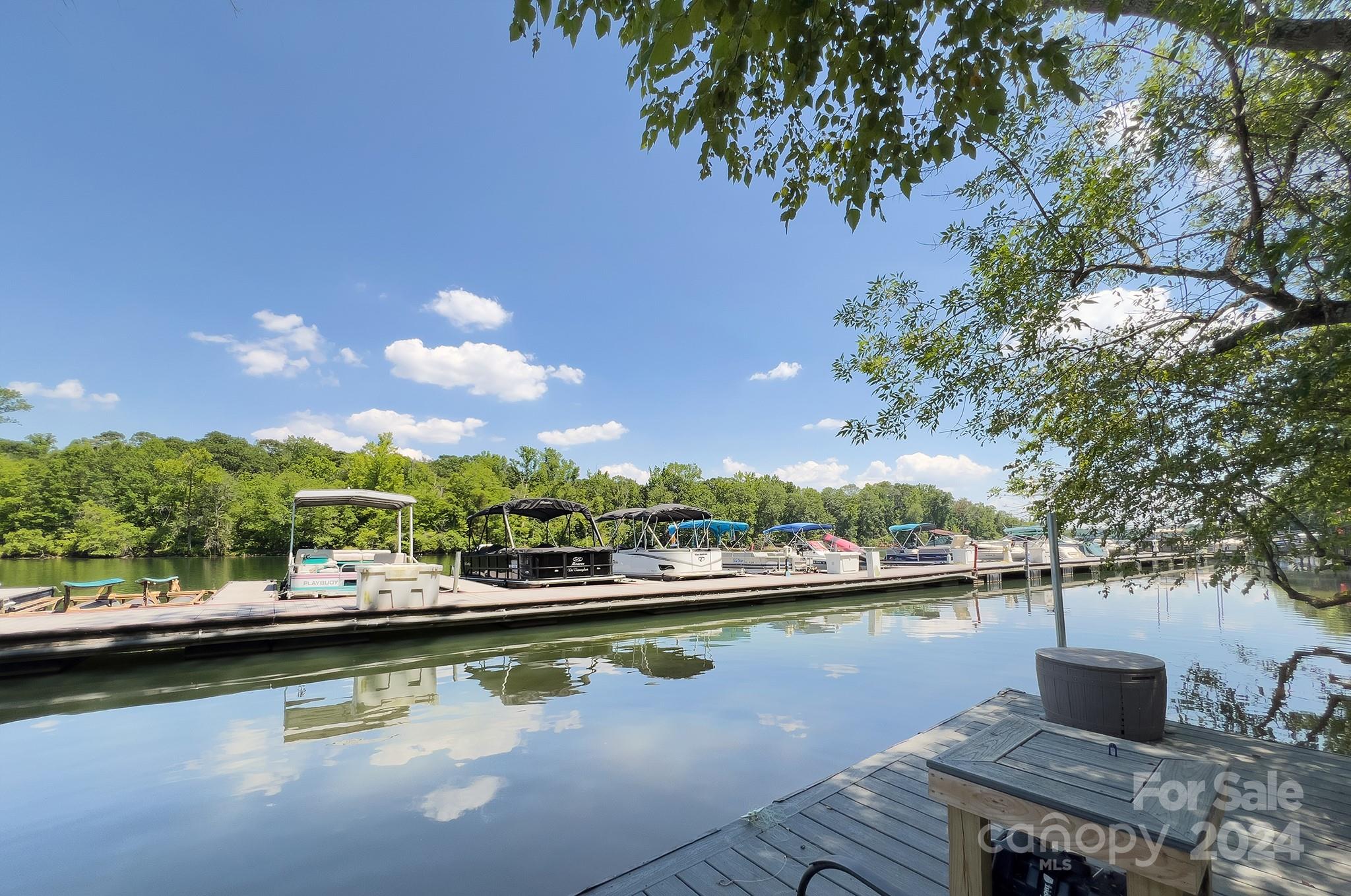144 Lighthouse Road Mount Holly, NC 28120 - Photo 36 of 48 a view of swimming pool with outdoor seating