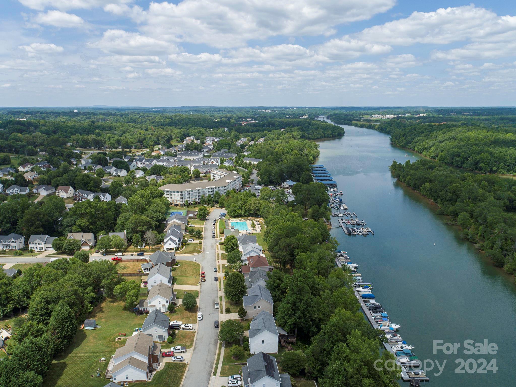 144 Lighthouse Road Mount Holly, NC 28120 - Photo 44 of 48 an aerial view of residential building and lake