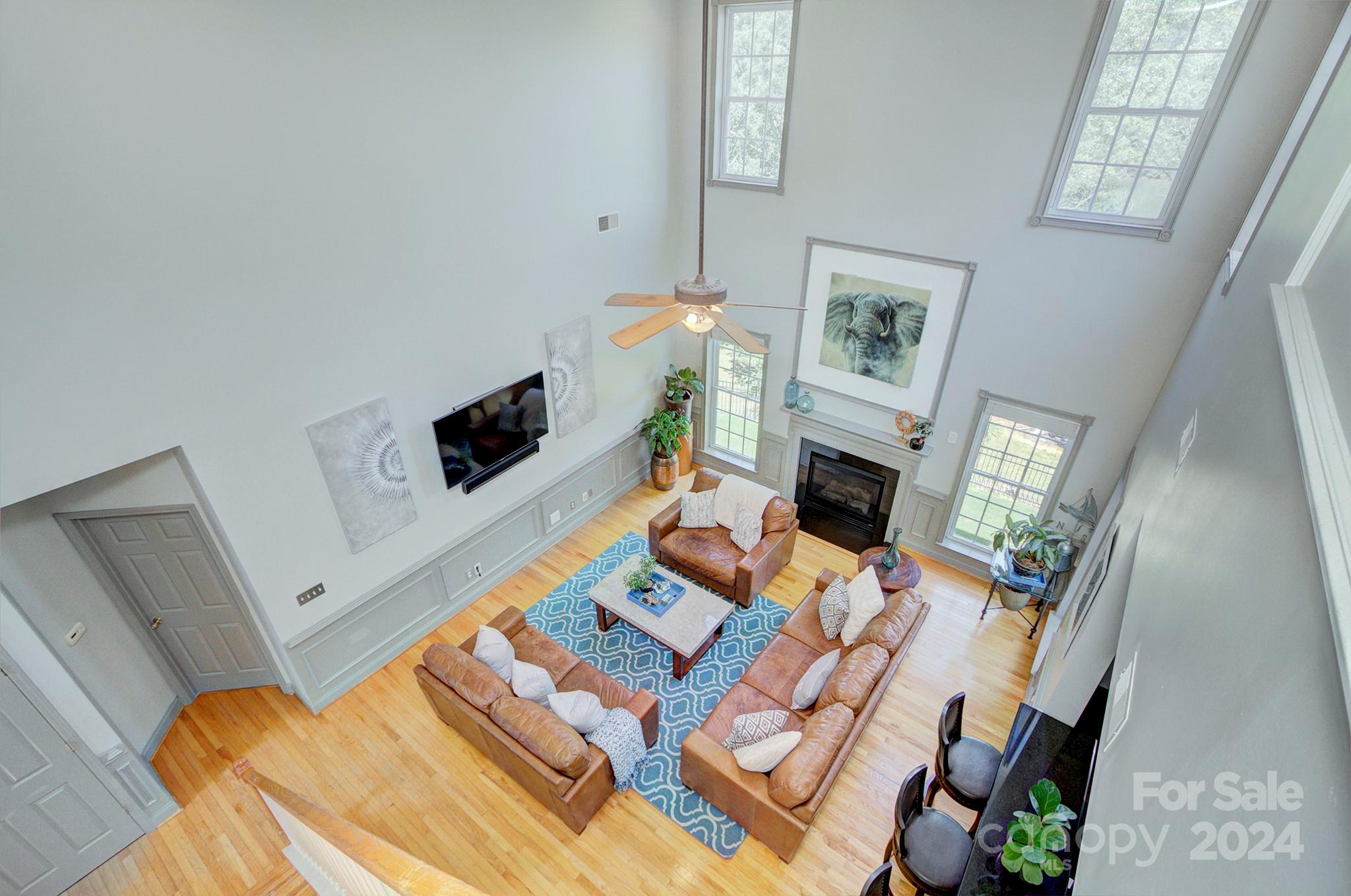 144 Lighthouse Road Mount Holly, NC 28120 - Photo 8 of 48 a living room with furniture and a flat screen tv